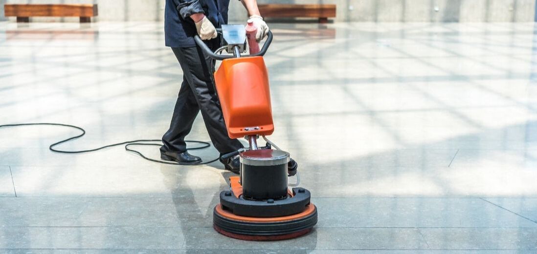 Picture of person polishing floor