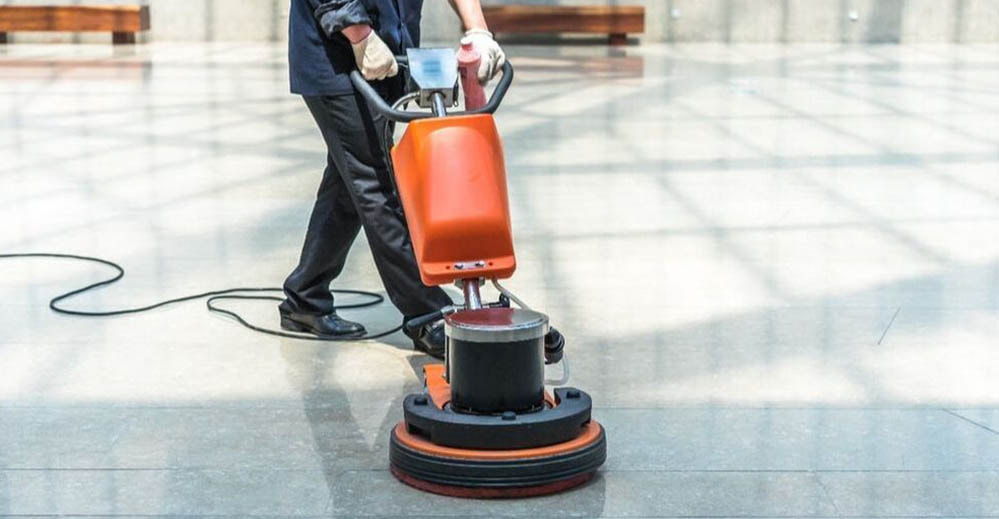 Image of peron using floor cleaner