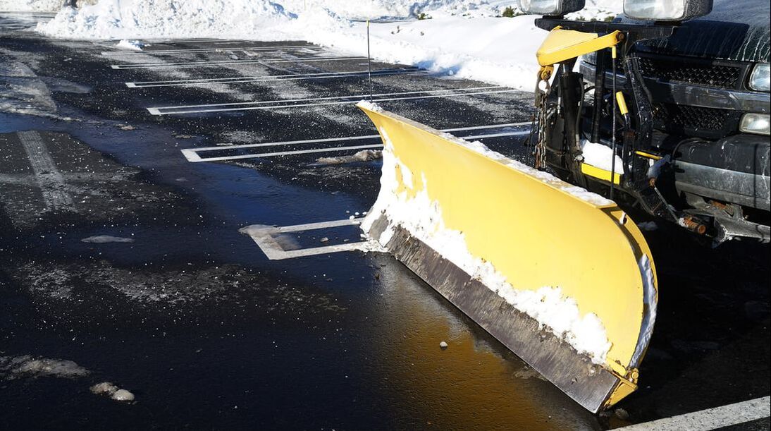 Picture of Snow Plow in Snowy Parking Lot